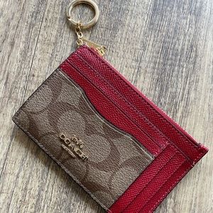 Coach xl card holder with key ring.